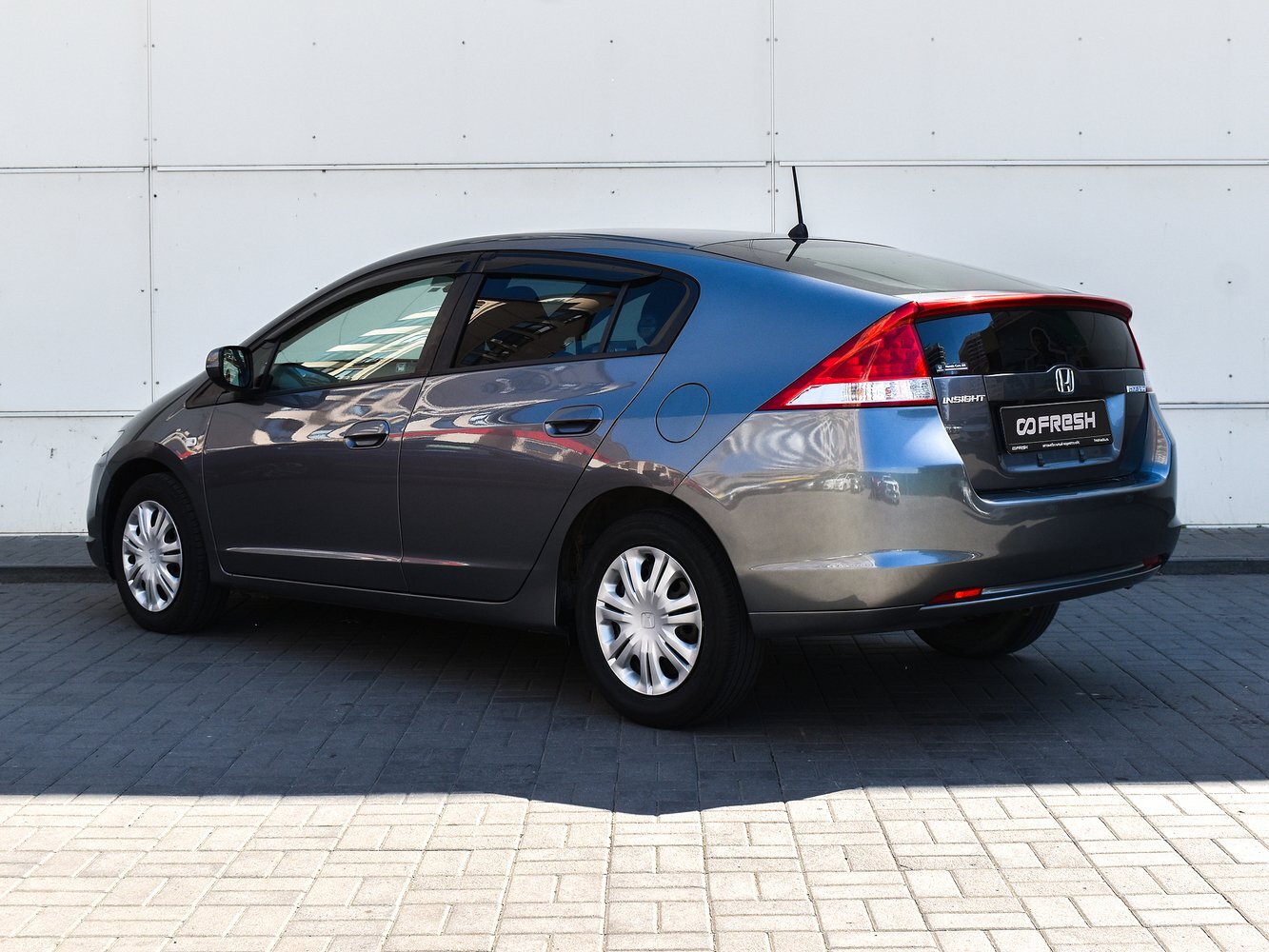Insight 2009. Honda insight 2009. хонда инсайт 2009 г. хонда инсайт 2009 светло серебристая с пойлером. honda insight 2009 серая без номеров.